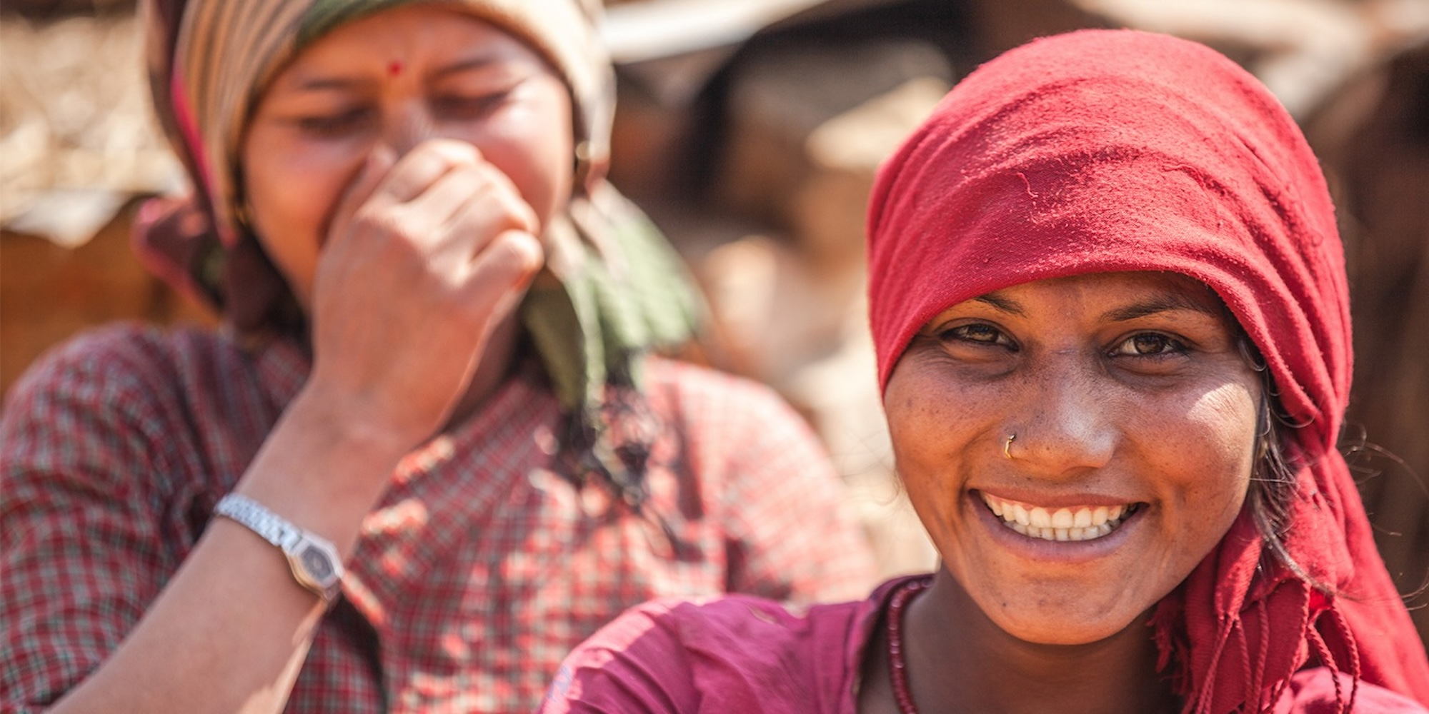 People from across the world smiling