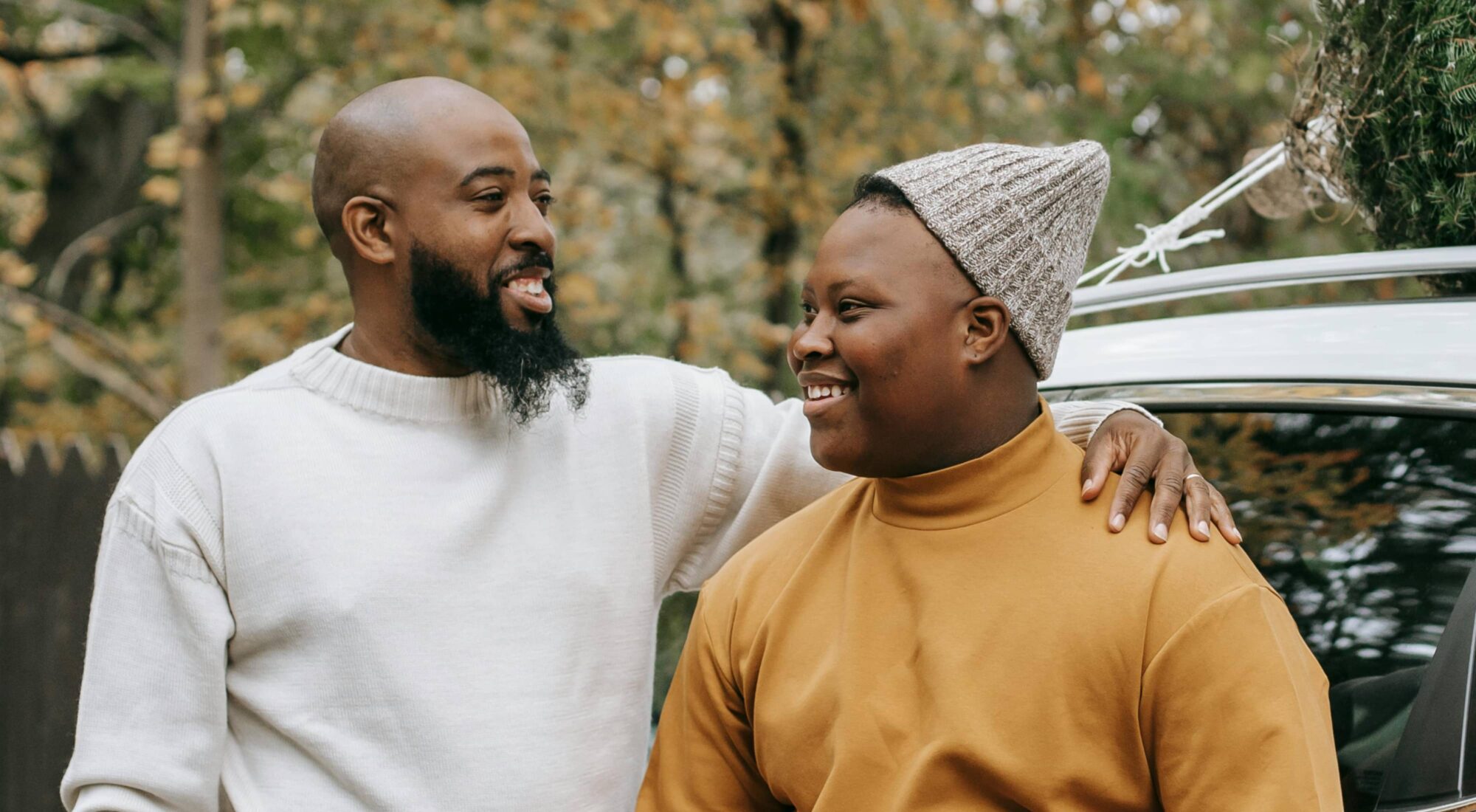 A father and son share a quiet, happy moment.