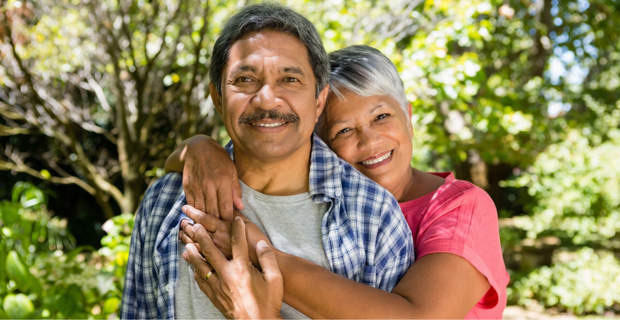 Couple holding each other and smiling